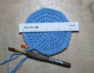 Measuring across the diameter of your crown. This was the original Little Noggin Cap.