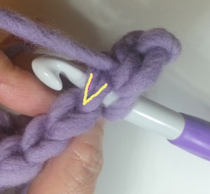 Insert hook under 2 legs