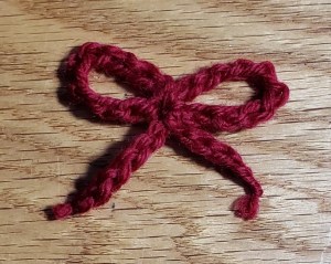 Crocheted bow without sewing wrap.